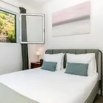Modern Tropical Hideaway By Lovelystay